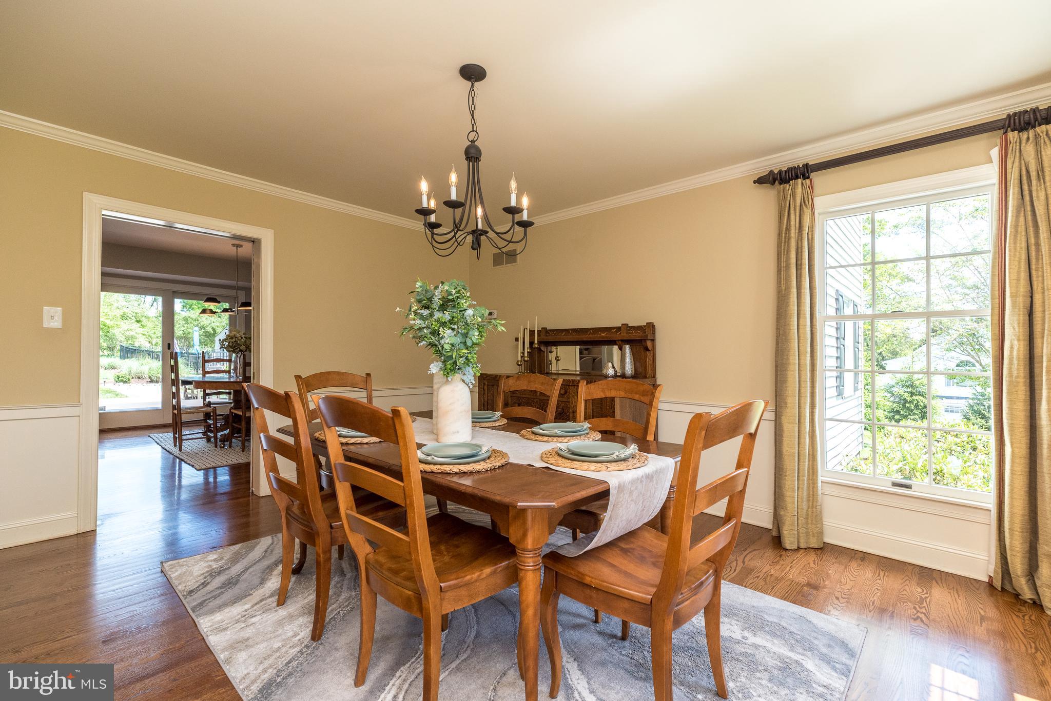 4976 Gloucester Drive Doylestown, PA 18902 - Photo 10 of 68 a view of a dining room with furniture window and wooden floor