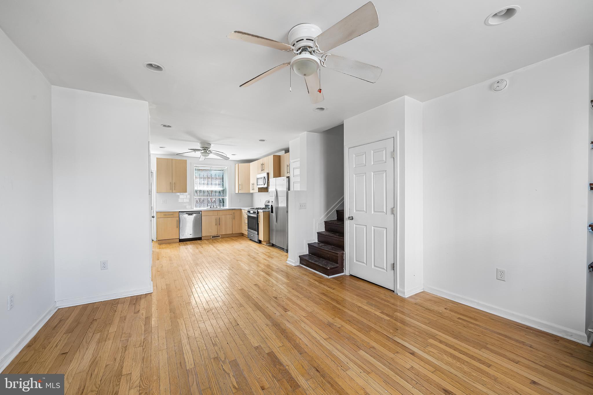 1615 North Philip Street Philadelphia, PA 19122 - Photo 2 of 22 a view of a kitchen with wooden floor and a kitchen space