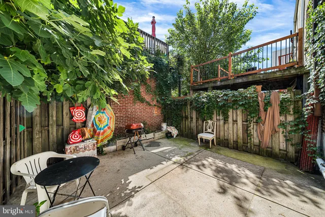 an outdoor space with seating area
