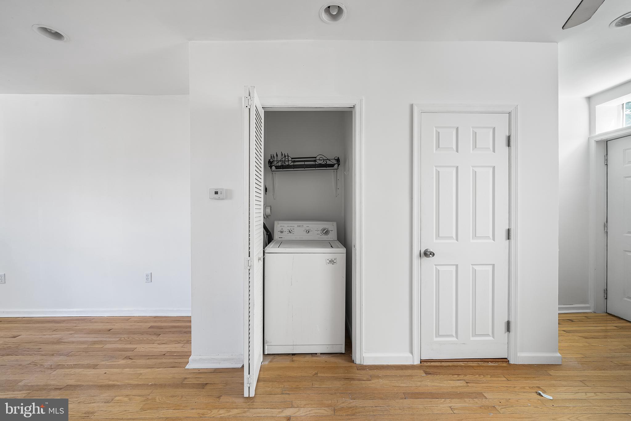 1615 North Philip Street Philadelphia, PA 19122 - Photo 7 of 22 a view of a room with wooden floor