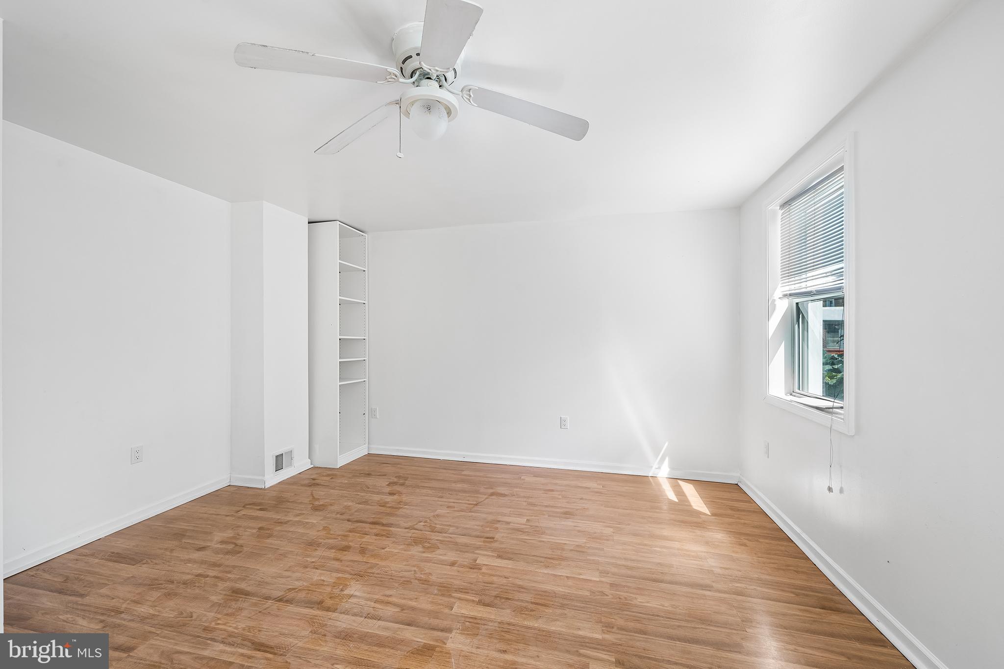 1615 North Philip Street Philadelphia, PA 19122 - Photo 10 of 22 a view of empty room with wooden floor