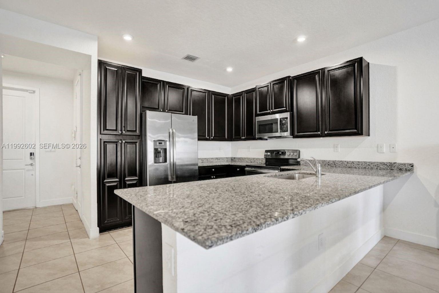 10945 Southwest 235th Lane Homestead, FL 33032 - Photo 7 of 26