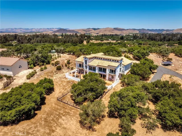 a view of a city with a building in the background