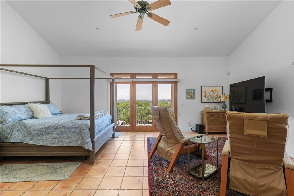 1790 Calle Laguna Arroyo Grande, CA 93420 - Photo 25 of 53 a living room with furniture and a flat screen tv