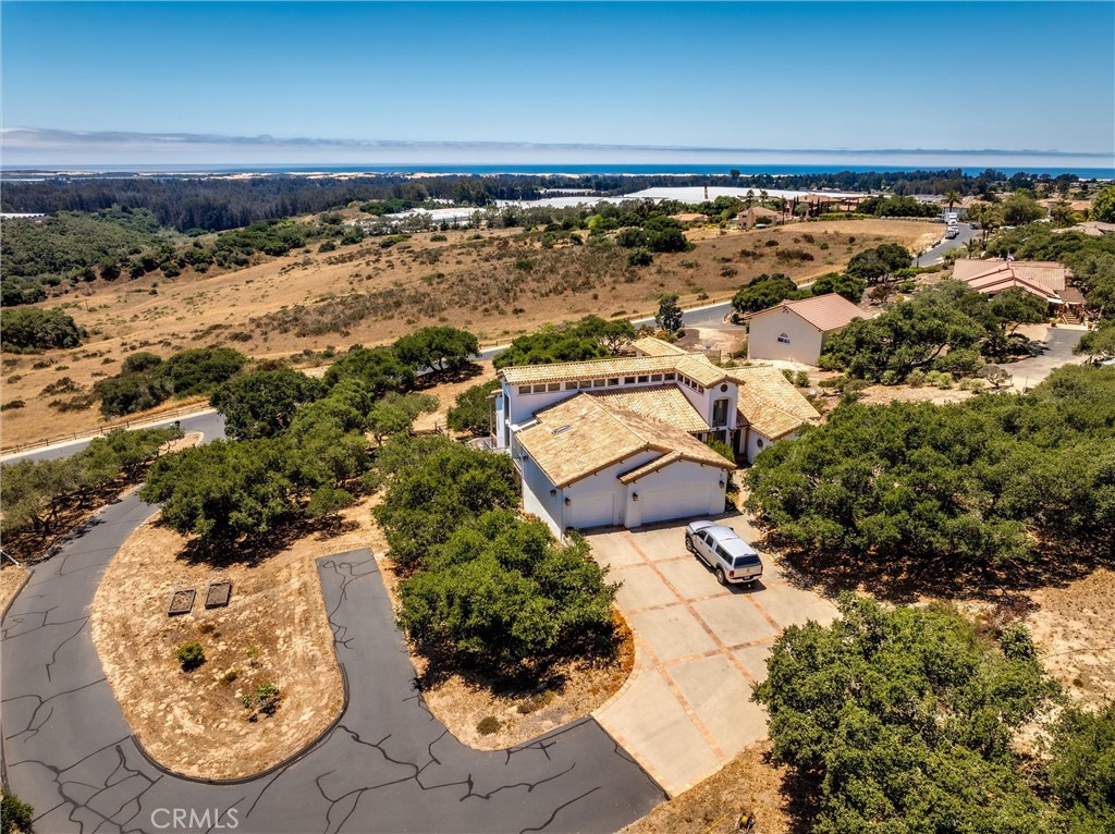 1790 Calle Laguna Arroyo Grande, CA 93420 - Photo 3 of 53 an aerial view of a backyard of a house with a table & chairs