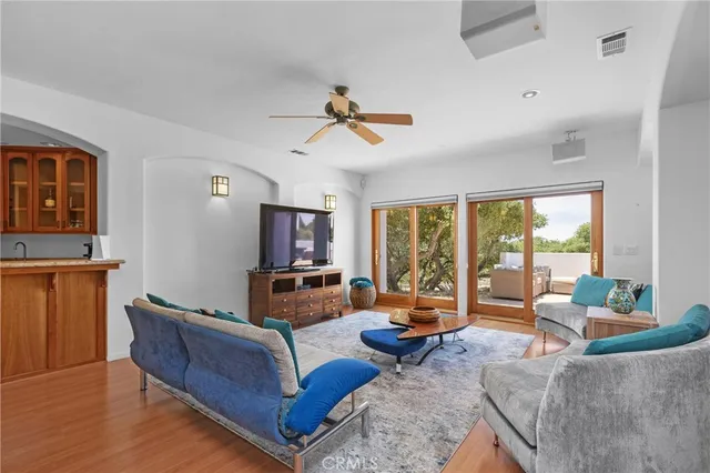 a bathroom with a bathtub and a window