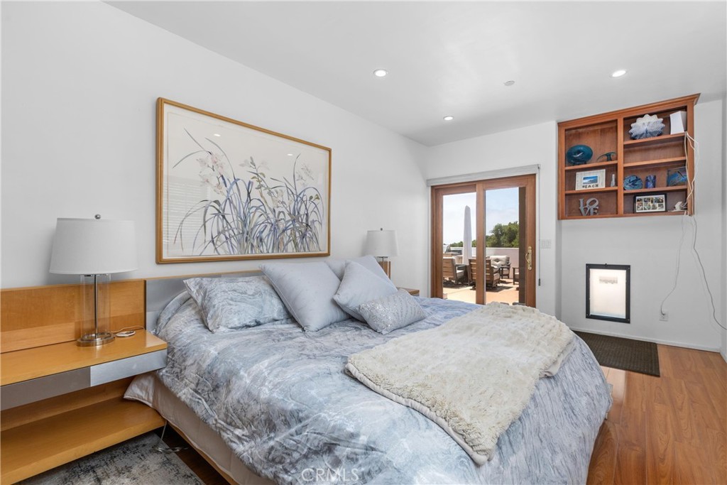 1790 Calle Laguna Arroyo Grande, CA 93420 - Photo 33 of 53 a bedroom with a large bed and a couch