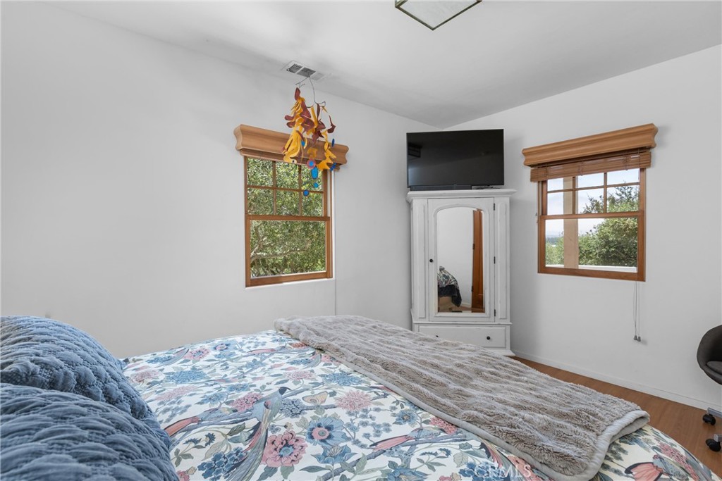1790 Calle Laguna Arroyo Grande, CA 93420 - Photo 37 of 53 a bedroom with a bed and a window