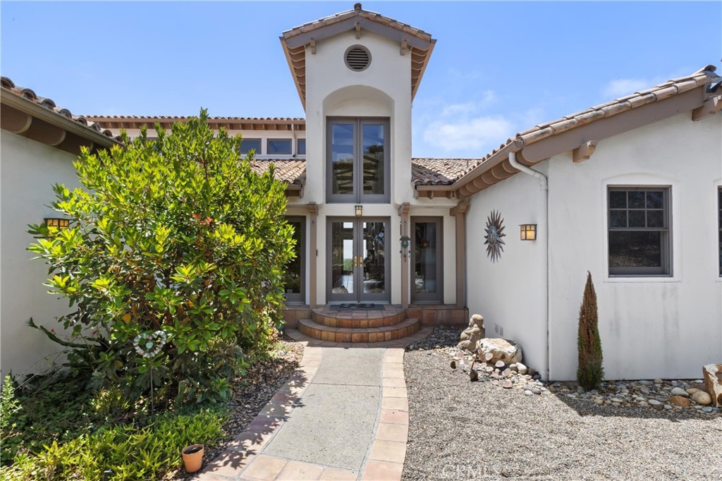 1790 Calle Laguna Arroyo Grande, CA 93420 - Photo 5 of 53 a front view of a house with garden