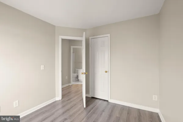 a view of wooden floor in an empty room