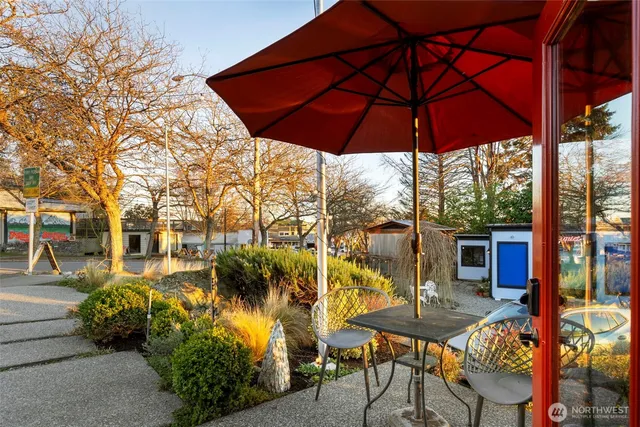 a lobby with furniture and a chandelier