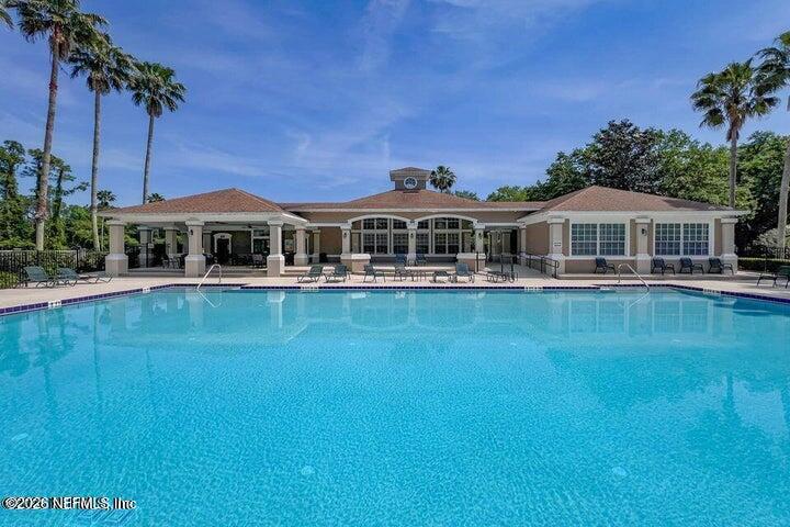 a front view of a building with garden