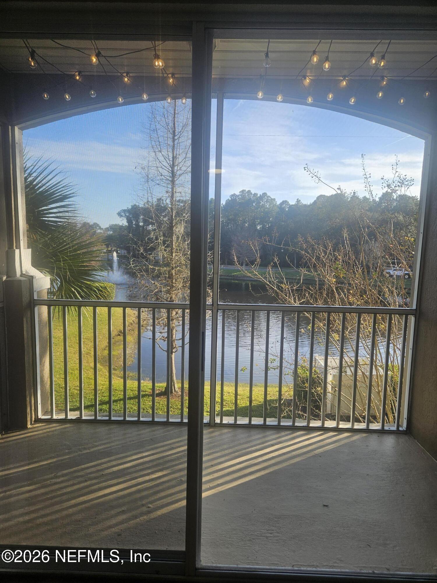 10550 Baymeadows Road, Unit 323 Jacksonville, FL 32256 - Photo 13 of 50 a view of a glass door with a balcony