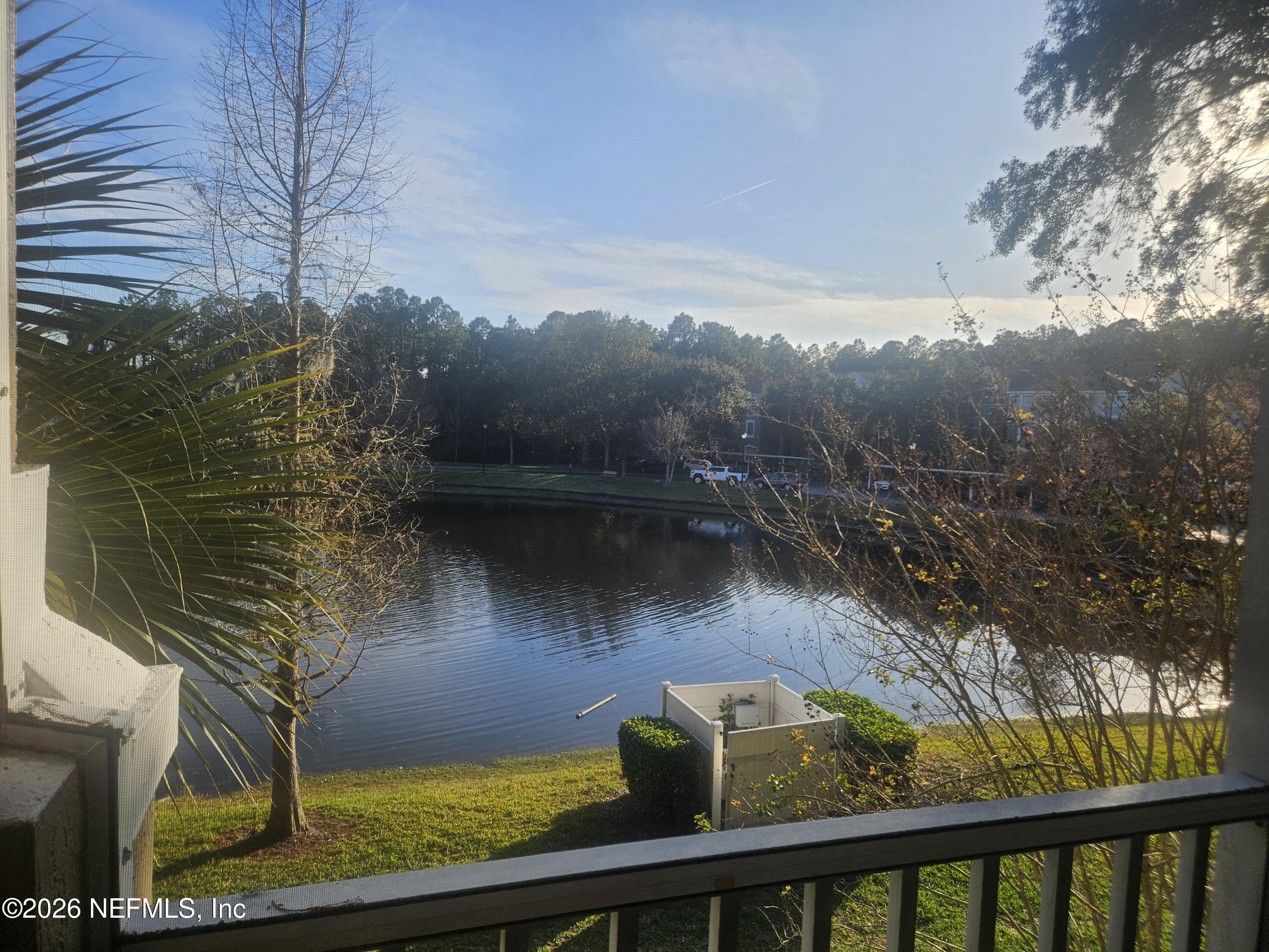 10550 Baymeadows Road, Unit 323 Jacksonville, FL 32256 - Photo 14 of 50 a view of a lake from a balcony