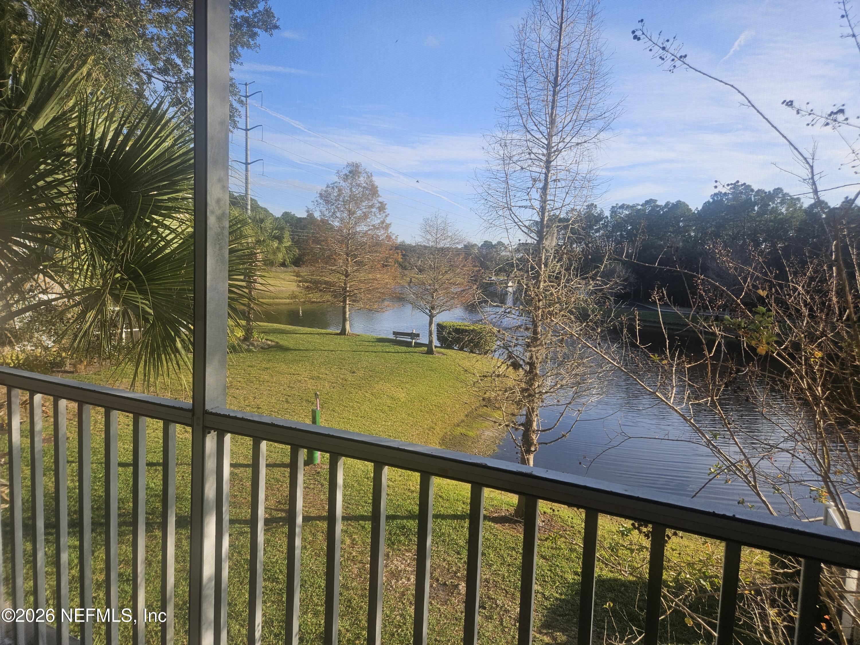 10550 Baymeadows Road, Unit 323 Jacksonville, FL 32256 - Photo 17 of 50 a view of a balcony with yard