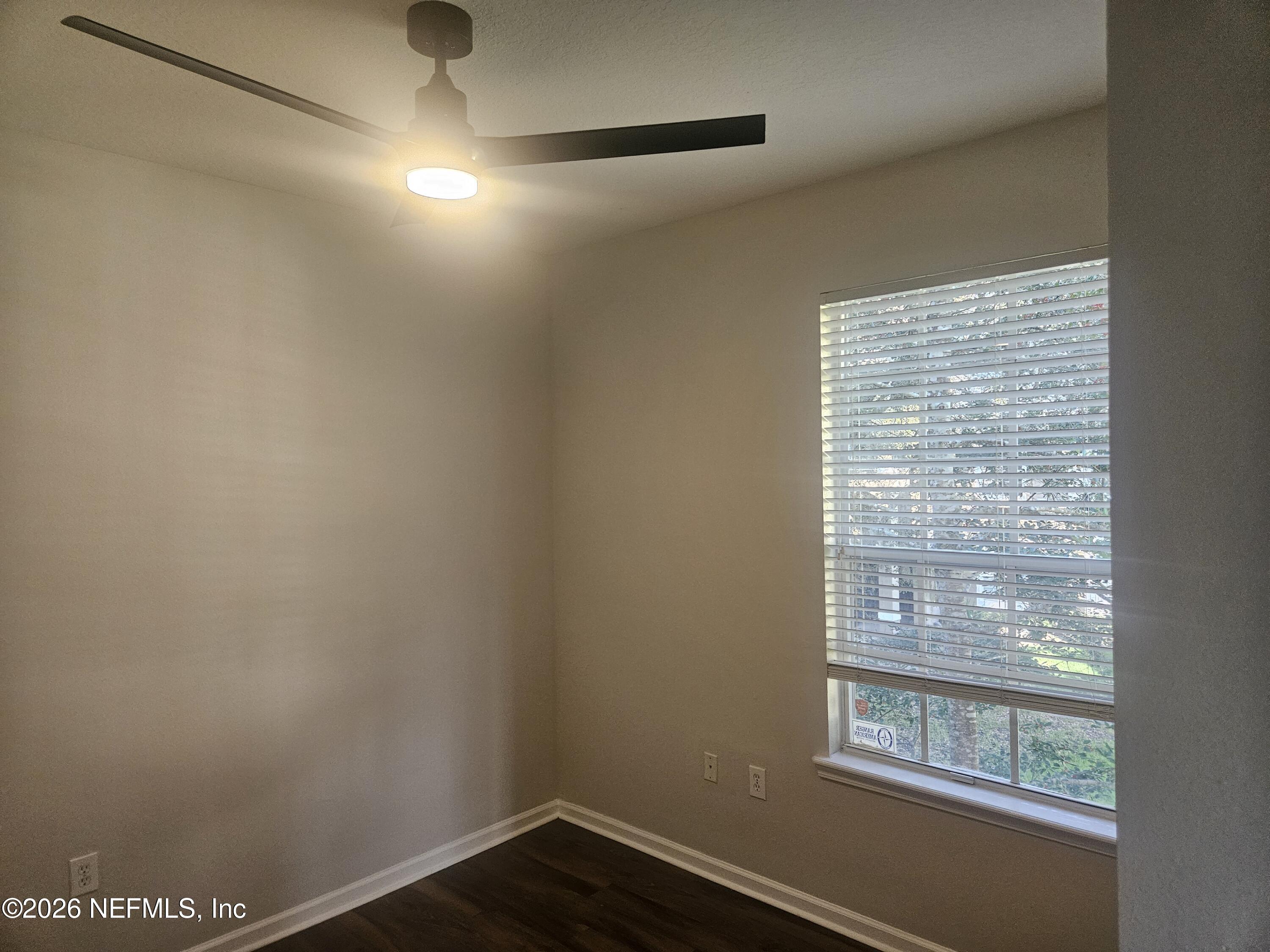 10550 Baymeadows Road, Unit 323 Jacksonville, FL 32256 - Photo 28 of 50 a view of small space with wooden floor and windows