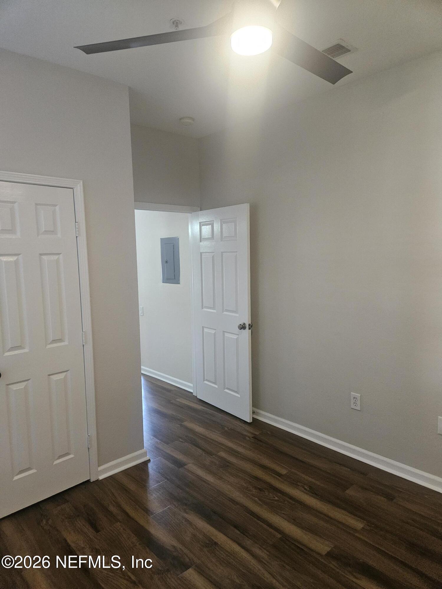 10550 Baymeadows Road, Unit 323 Jacksonville, FL 32256 - Photo 29 of 50 a view of an empty room with wooden floor