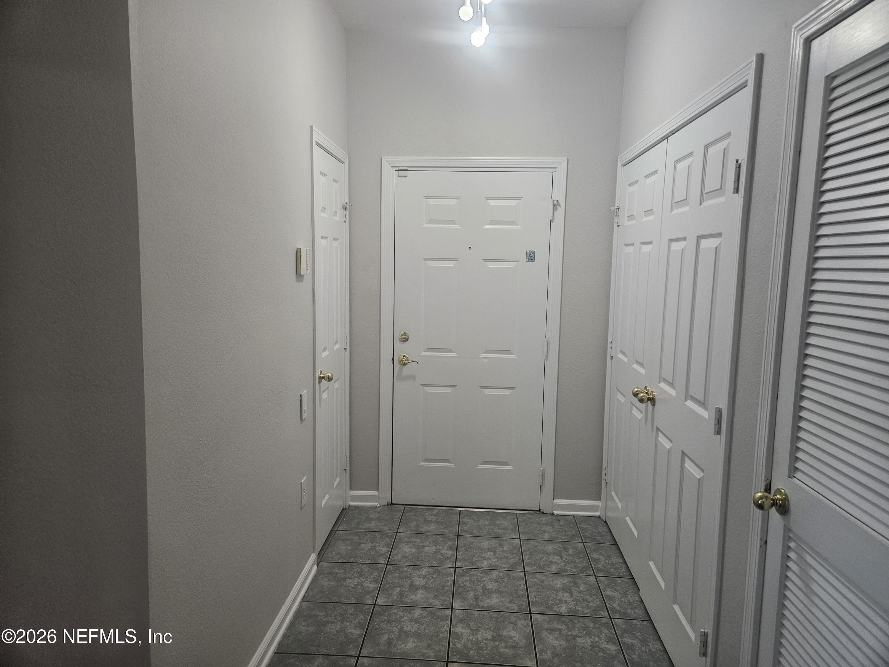 10550 Baymeadows Road, Unit 323 Jacksonville, FL 32256 - Photo 4 of 50 a view of a hallway