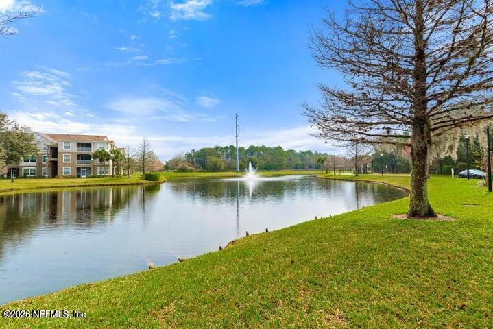 10550 Baymeadows Road, Unit 323 Jacksonville, FL 32256 - Photo 45 of 50 a view of a lake with houses in the background