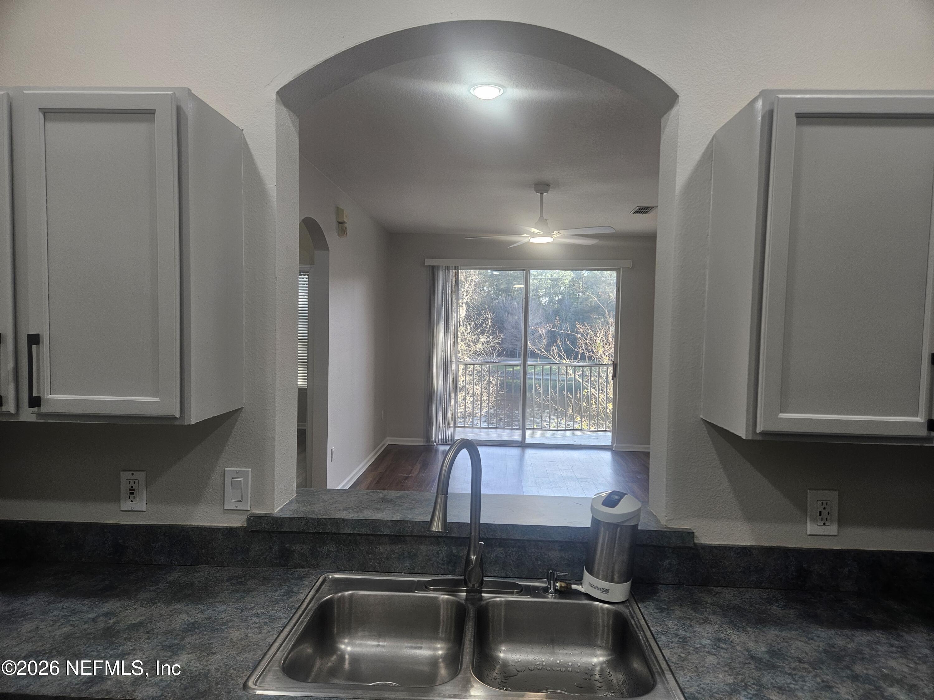 10550 Baymeadows Road, Unit 323 Jacksonville, FL 32256 - Photo 8 of 50 a kitchen with a sink and cabinets