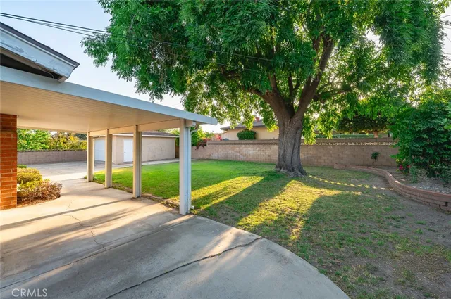a view of a backyard with a small cabin
