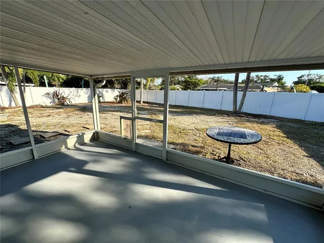 a view of a swimming pool and outdoor space
