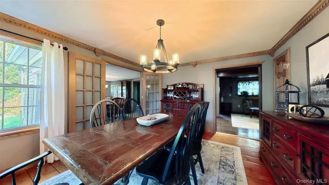 a view of a balcony with furniture