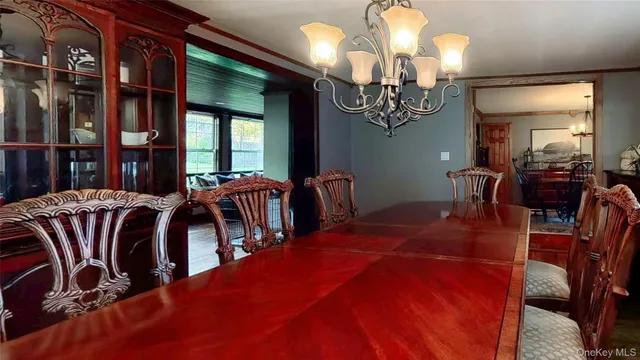 a room with furniture and a potted plant