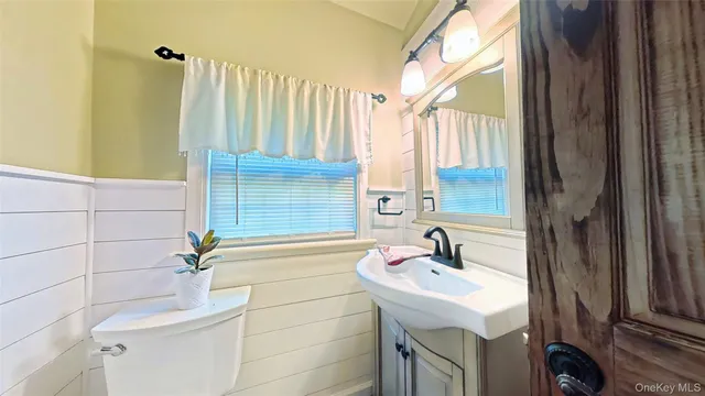 a living room filled with furniture and a rug