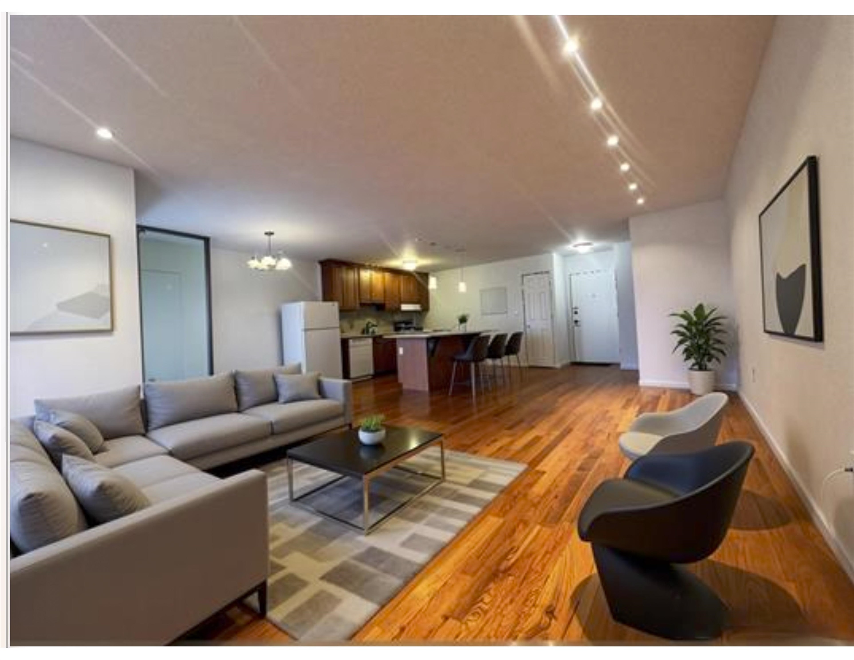 a living room with furniture and a table