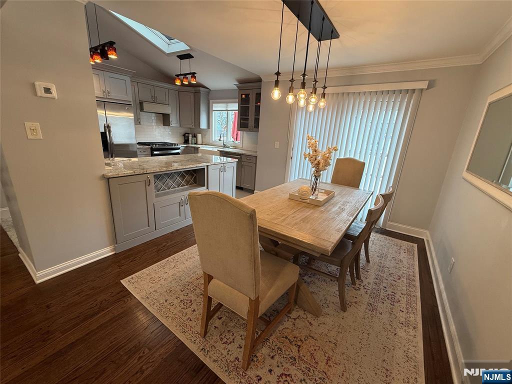 9 Gibbs Road Dumont, NJ 07628 - Photo 8 of 21 a view of a dining room with furniture and wooden floor