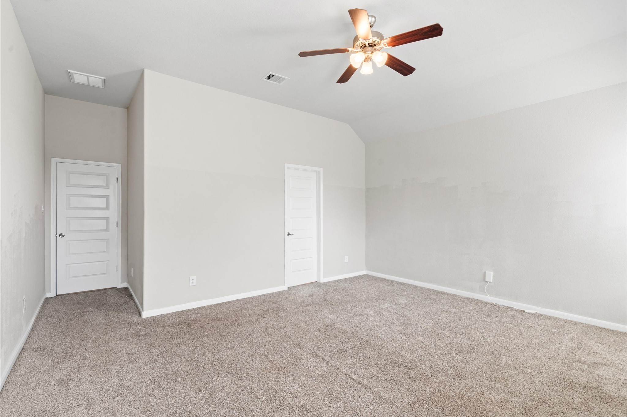 410 Richfish Run Drive Rosenberg, TX 77469 - Photo 14 of 30 Spacious Master Bedroom with Ample Natural Light from Dual Windows