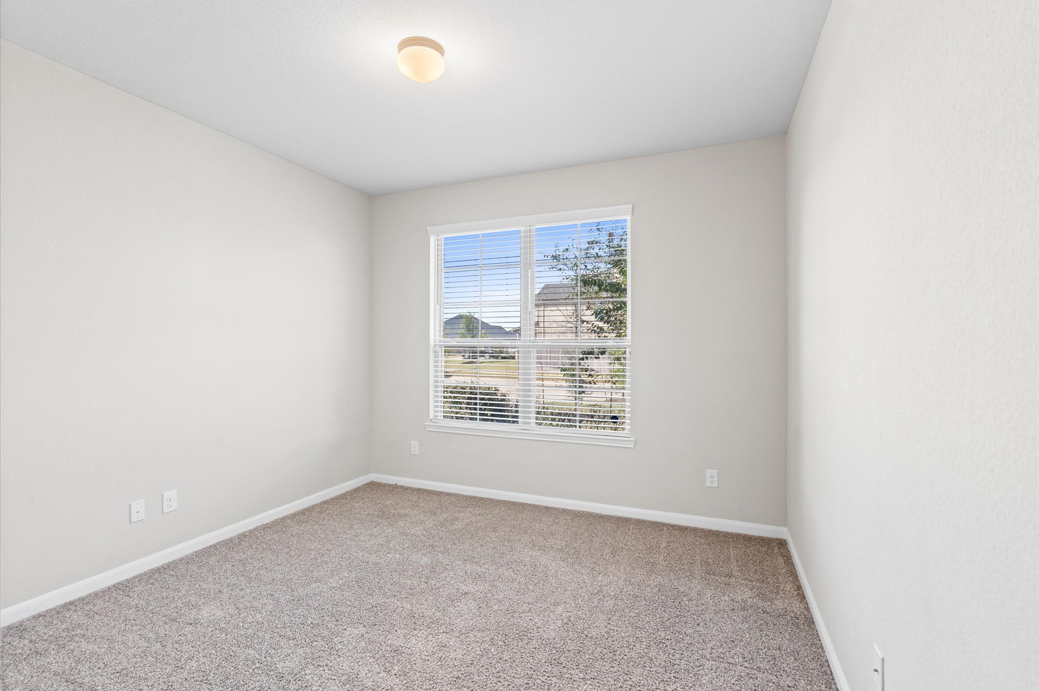 410 Richfish Run Drive Rosenberg, TX 77469 - Photo 18 of 30 Charming Guest Bedroom with Ample Natural Light