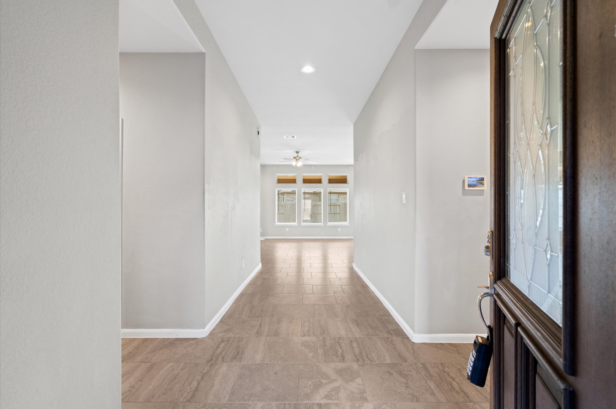 410 Richfish Run Drive Rosenberg, TX 77469 - Photo 5 of 30 Spacious Entryway with Soaring Ceilings.