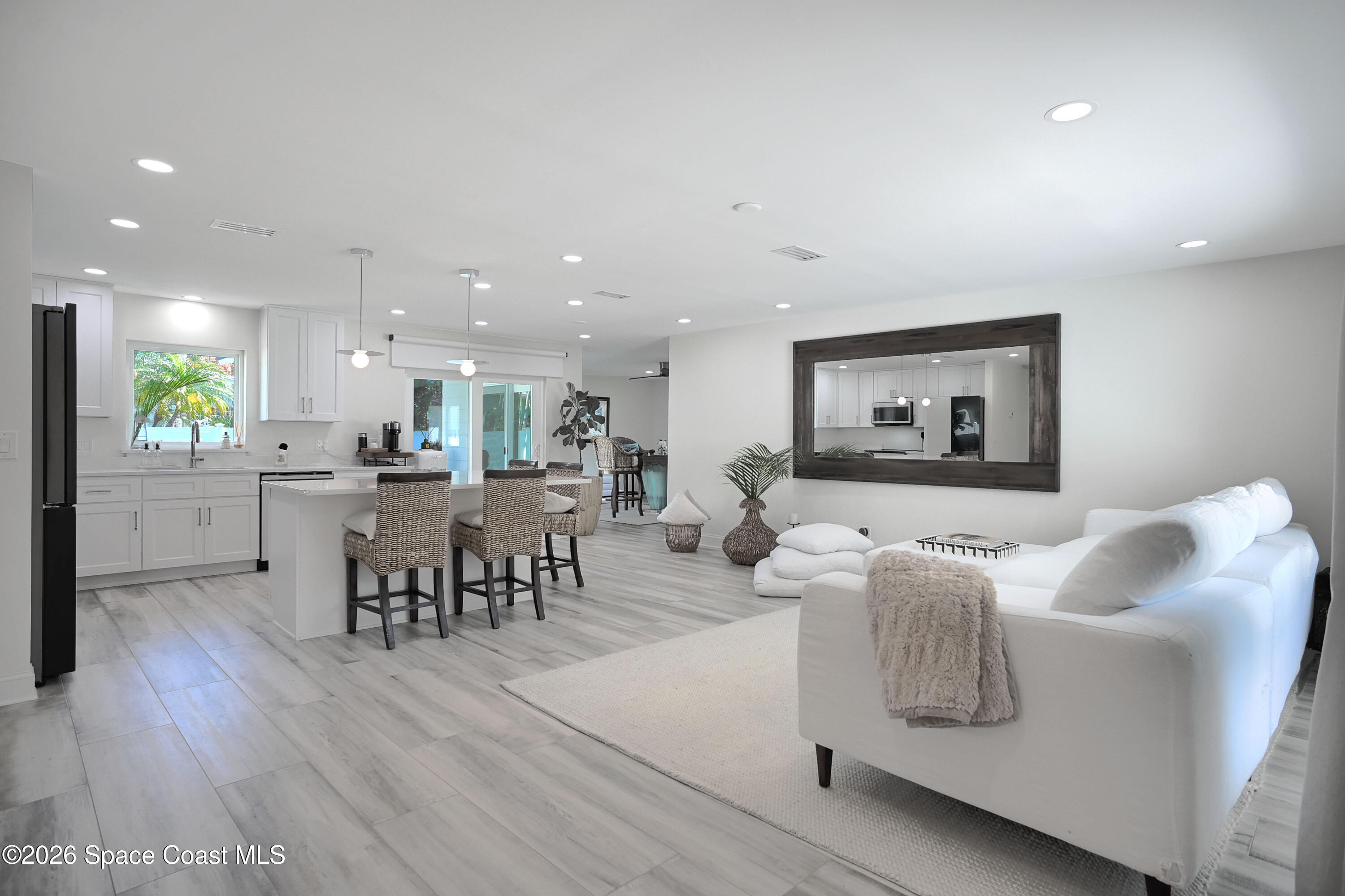 1162 Samar Road Cocoa Beach, FL 32931 - Photo 2 of 27 Open Living & Dining Space