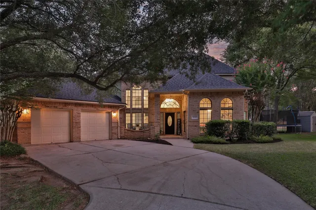 a living room with furniture and flat screen tv