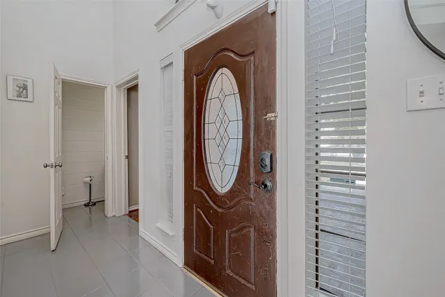 a living room with fireplace furniture and a flat screen tv