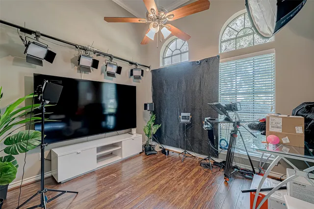 a kitchen with stainless steel appliances a white table and chairs in it