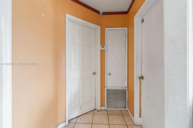 a view of a bathroom with a shower and a sink
