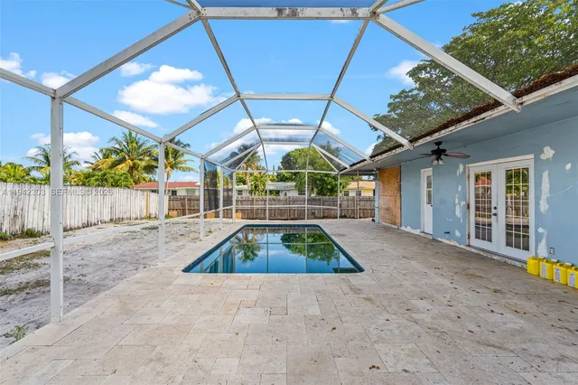 a view of a house with a swimming pool