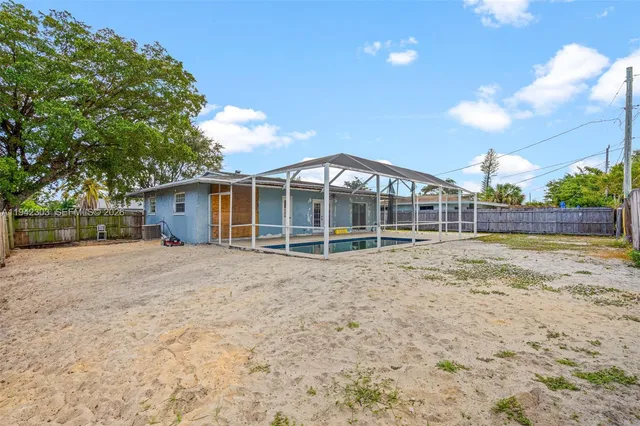 a house view with a garden space