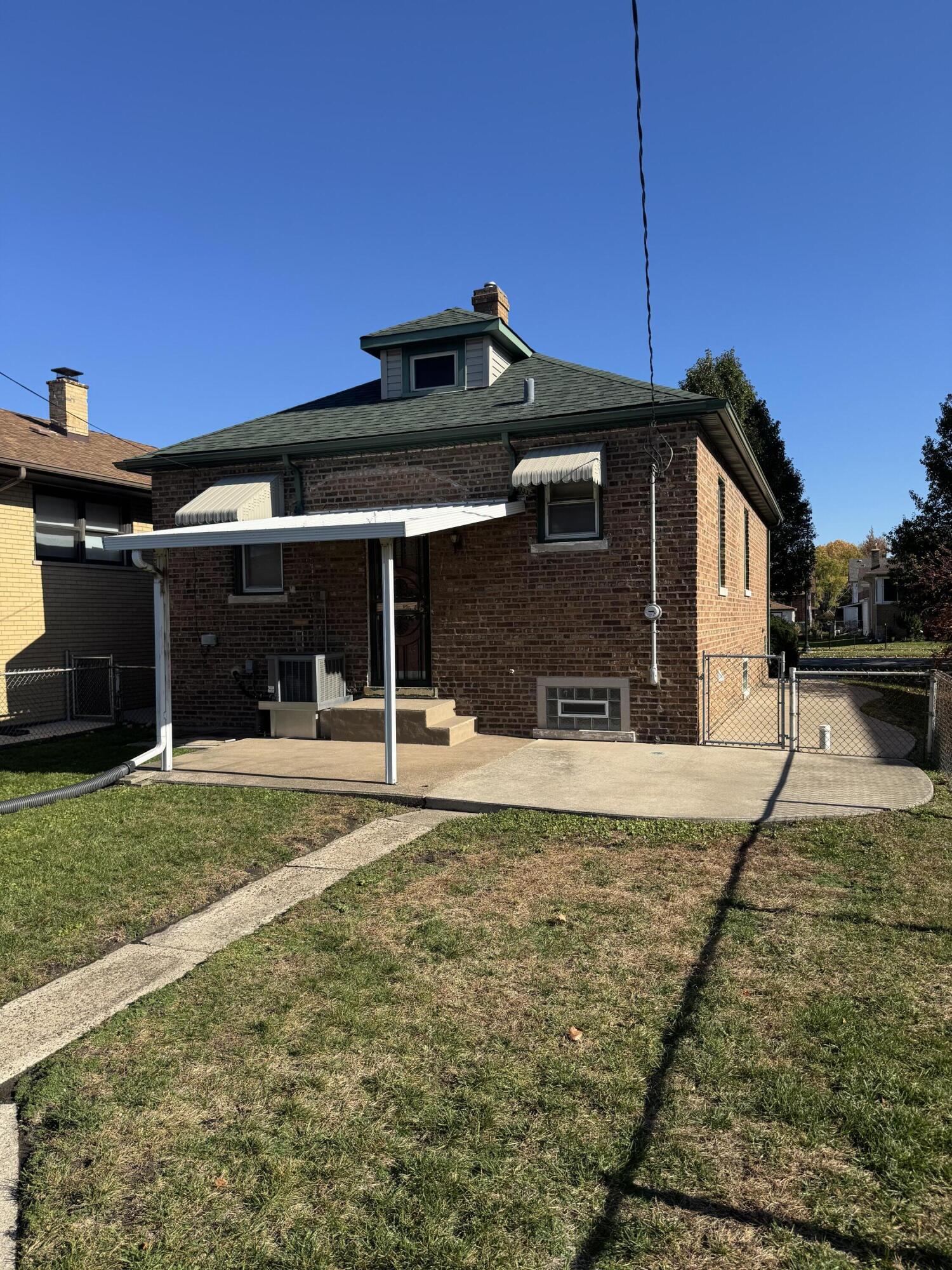 2144 Superior Avenue Whiting, IN 46394 - Photo 3 of 12 a front view of a house with a yard