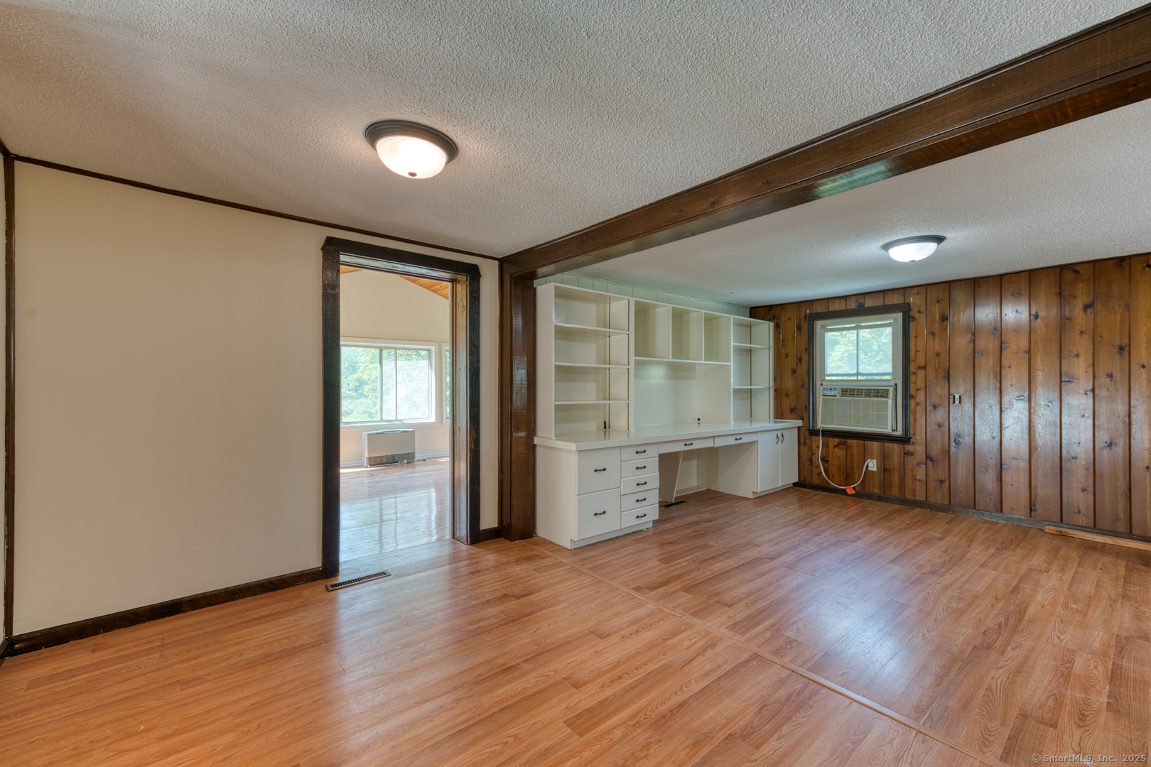134 East Street Litchfield, CT 06759 - Photo 17 of 38 an empty room with wooden floor and windows