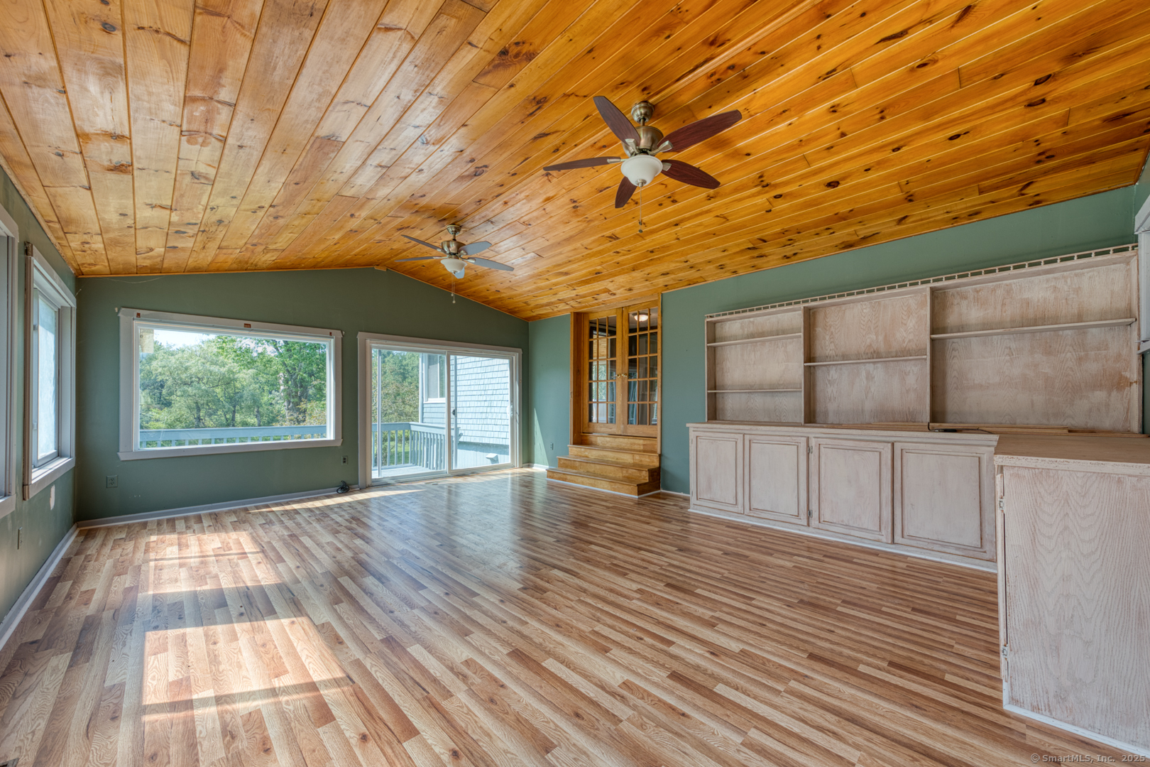 134 East Street Litchfield, CT 06759 - Photo 25 of 38 a view of an empty room with wooden floor and a window
