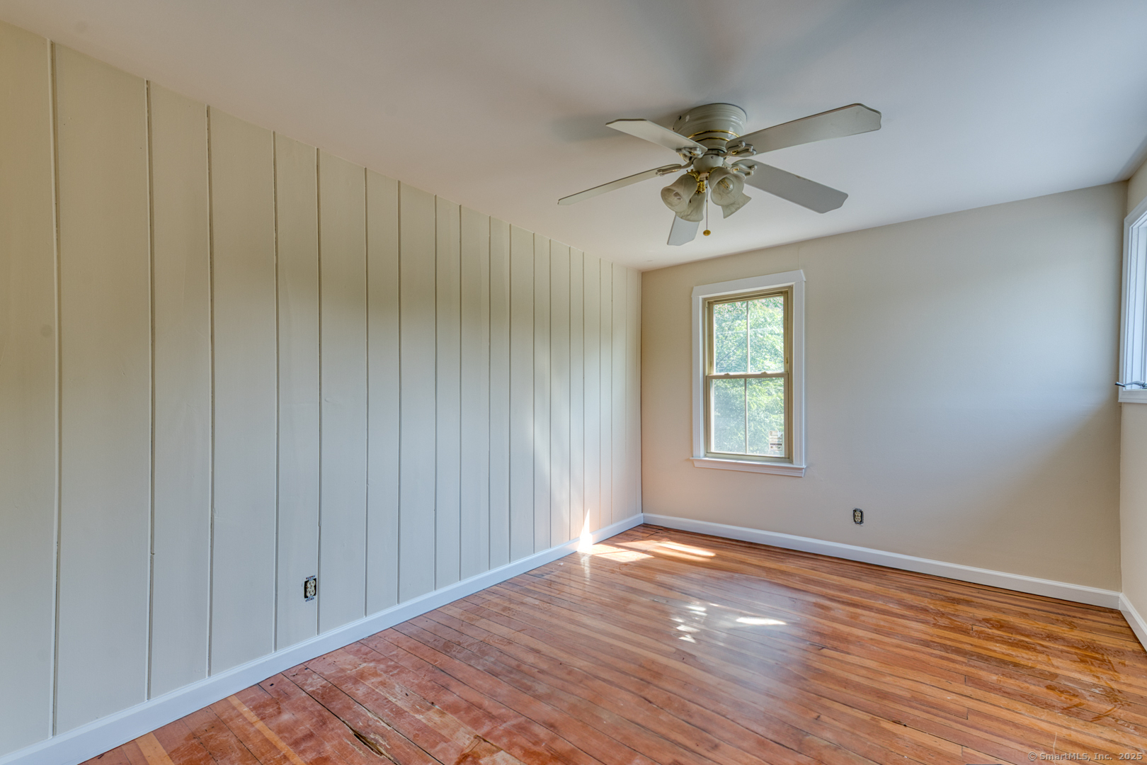134 East Street Litchfield, CT 06759 - Photo 33 of 38 a view of a livingroom with a ceiling fan and window