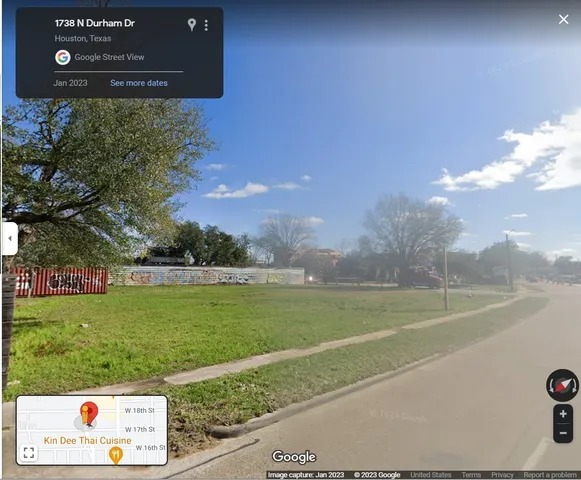a view of a big yard with potted plants