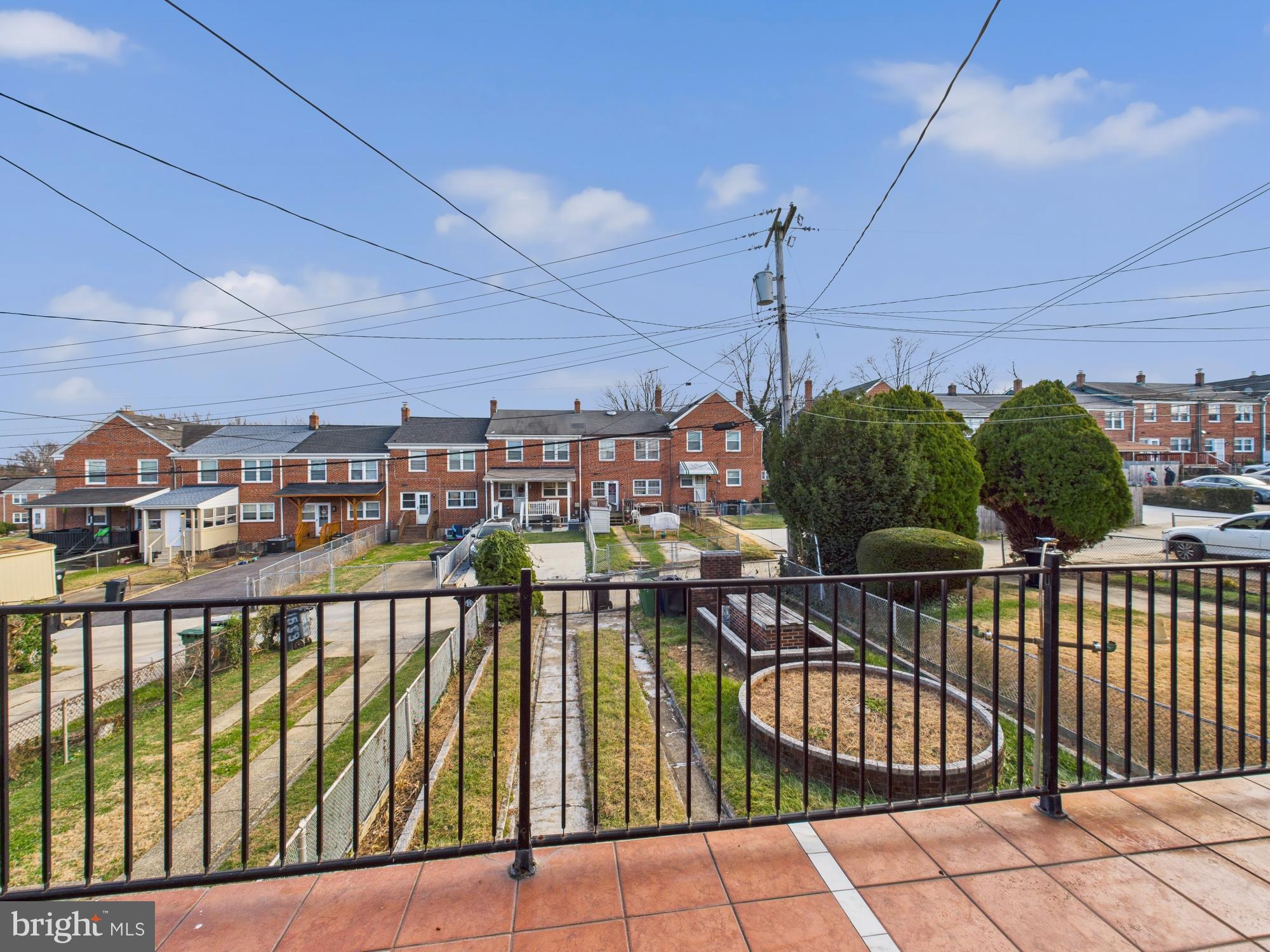 1551 Langford Road Baltimore, MD 21207 - Photo 18 of 52 a view of a chairs and table in the balcony