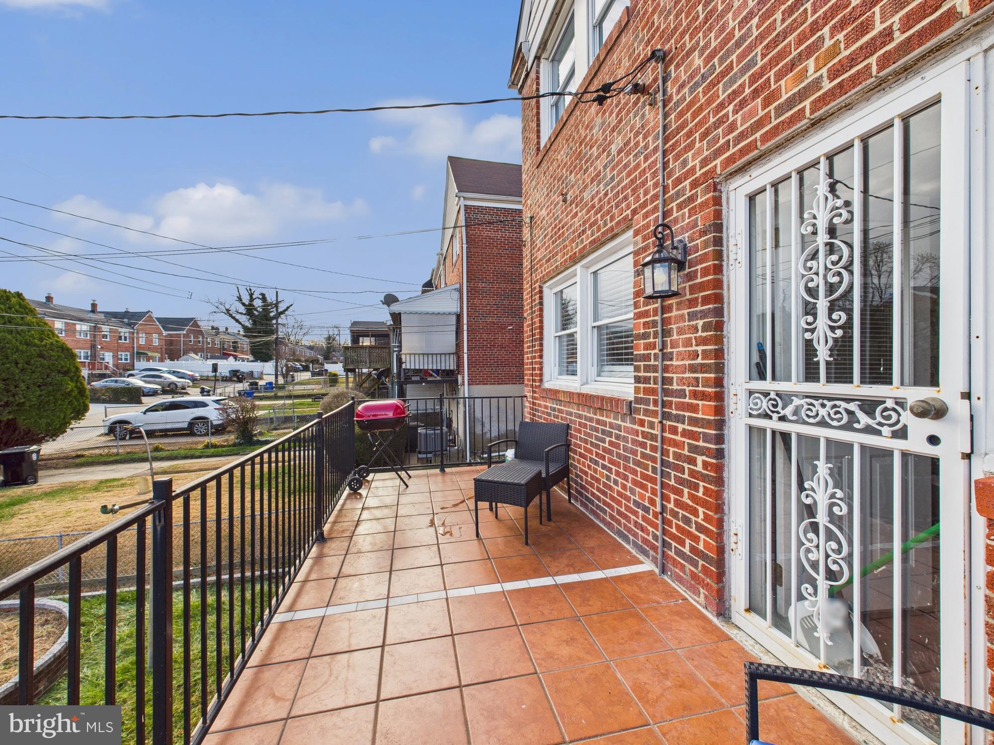 1551 Langford Road Baltimore, MD 21207 - Photo 22 of 52 a view of a balcony with wooden floor