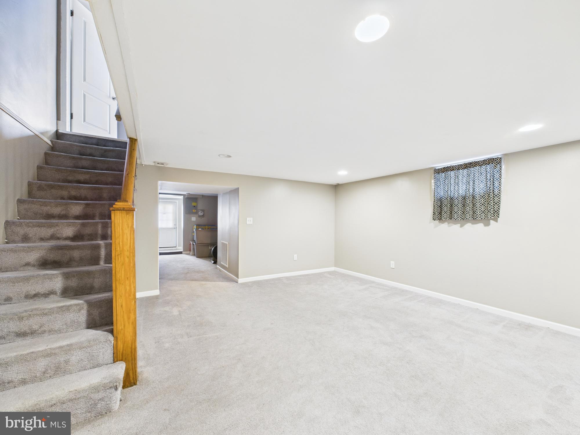 1551 Langford Road Baltimore, MD 21207 - Photo 27 of 52 a view of an empty room with stairs