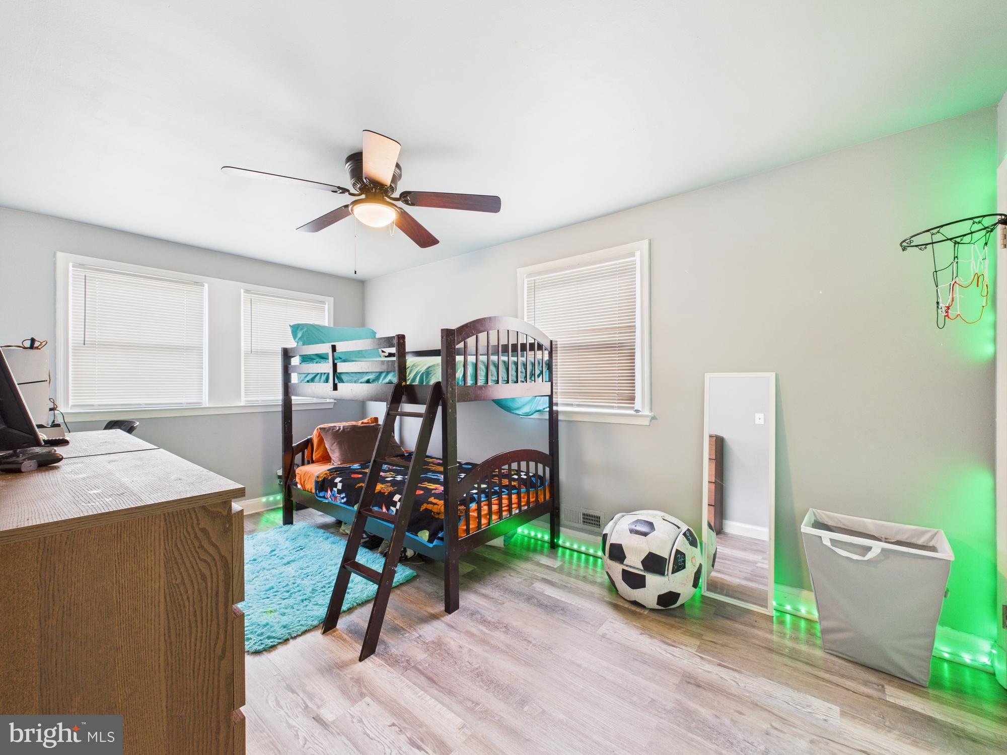 1551 Langford Road Baltimore, MD 21207 - Photo 35 of 52 a view of a dining room with furniture wooden floor and a chandelier